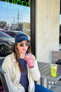 Social media influencer drinking smoothie