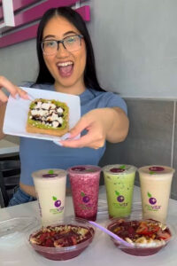 Social media influencer holding healthy toast