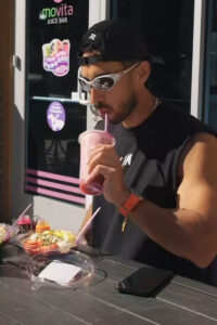 Social media influencer drinking smoothie