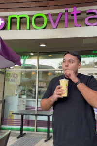 Social media influencer drinking smoothie